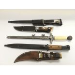 A small collection of replica German bayonets, dir