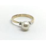 A 14ct yellow gold, diamond and pearl ring, size a