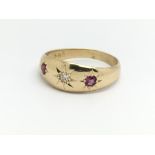 A vintage 18ct yellow gold diamond and ruby ring,