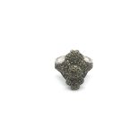 A silver marcasite ring, approx size N.