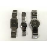 Three Tungsten watches with black dials.