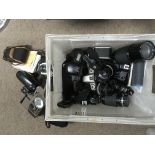 Another box of mixed cameras and lenses.