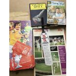 A collection of ladybird books and sports ephemera