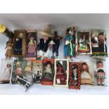 A collection of various vintage collector's dolls