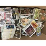 A collection of cigarette cards including Wills an