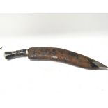 An old Kukri knife with a horn handle