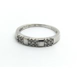 A 9ct white gold and diamond ring, approx 0.12ct,