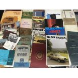 A collection of vintage car handbooks and sales br