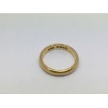 A 22ct gold wedding band, approx 5.4g and approx s