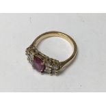An unmarked 18ct gold and pink sapphire and diamon