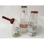 Automobile glass oil Bottles, one Esso, one Total
