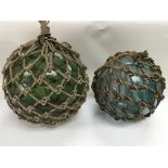 Two original large old blown glass net floats, app