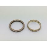 A 9ct gold ring and an unmarked eternity ring (2).