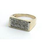 A 9ct yellow gold and diamond signet ring, size ap