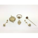 A small collection of gold jewellery including an