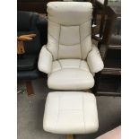 Two modern leather upholstered swivel armchairs wi