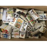 A collection of cigarette cards including Wills an