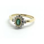 An 18ct yellow gold, diamond and emerald cluster r