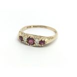 A 1950’s 9ct yellow gold ruby and diamond ring, si