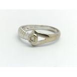 An 18ct white gold and diamond solitaire ring, app