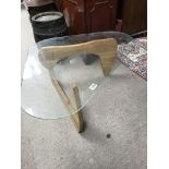 A modern design teak coffee table, glass top damag