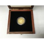 A 14ct gold 50 Dollar gold piece (bank of Nauru 19