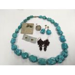 A Turquoise Polished Stone necklace With matching