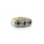 An 18ct sapphire and diamond ring, size approx L