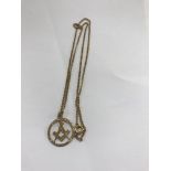 A 9 ct gold chain with Masonic pendant. 5 grams.