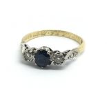 An 18ct yellow gold sapphire and diamond ring, app