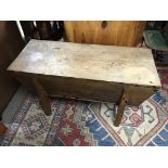 An antique Elm dough bin.