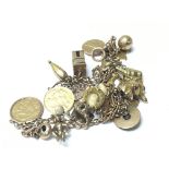 A 9carat gold charm bracelet with two attached hal