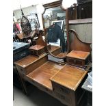 An Edwardian mirror back dressing table with cross