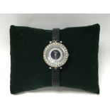 A ladies silver and stone set fashion watch - NO R