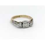 An 18ct yellow gold vintage ring with three diamon