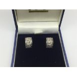 A pair of 9ct white gold earrings in Greek key pat