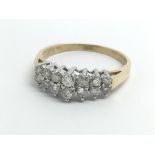 An 18ct yellow gold ring with two rows of diamonds