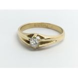 An 18ct yellow gold gents gypsy style ring set wit