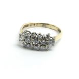 An 18ct yellow gold and diamond cluster ring, appr
