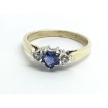 An 18ct yellow gold ring set with central heart sh