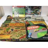 A collection of vintage board games including Emer