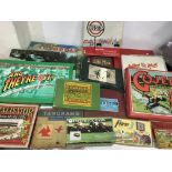 A collection of boxed vintage games including Toto