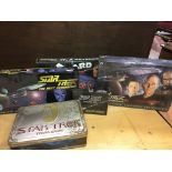 Star Trek board games and a keyboard.