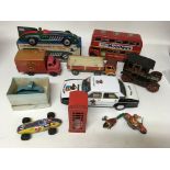 A collection of tinplate toys including Reproducti