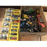 A box containing boxed and playworn diecast vehicl