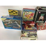 A collection of boxed toys including Coca Cola 1:6