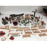 A collection of Britains lead farm yard figures in