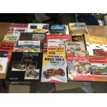 A collection of toy related books and magazines in