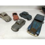 A collection of vintage battery operated vehicles