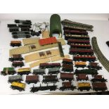 A box containing a collection of loose OO gauge ra